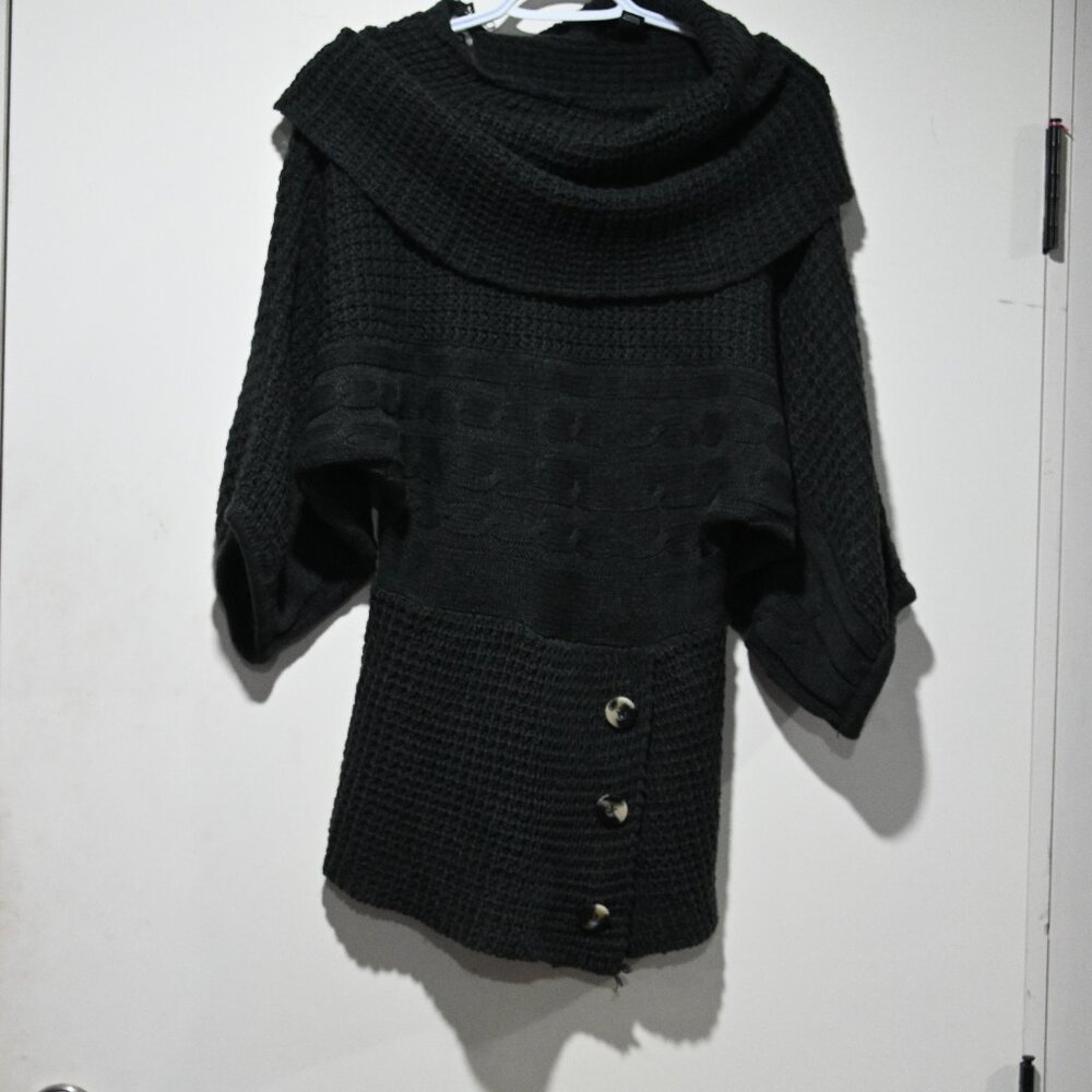 knitted sweater blue in color brand name Majora Made in Banladesh Size Med